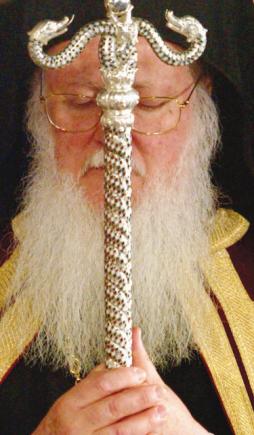 Greek Orthodox Ecumenical Patriarch Bartholomew holds his St. Andreas sceptre at the beginning of Greek Orthodox Easter mass in Aya Yorgi church in Istanbul, late April 26, 2003. Several hundreds ethnic Greeks and worshippers from Greece have attended the mass in Istanbul. REUTERS/Fatih Saribas --- Image by © Reuters/CORBIS